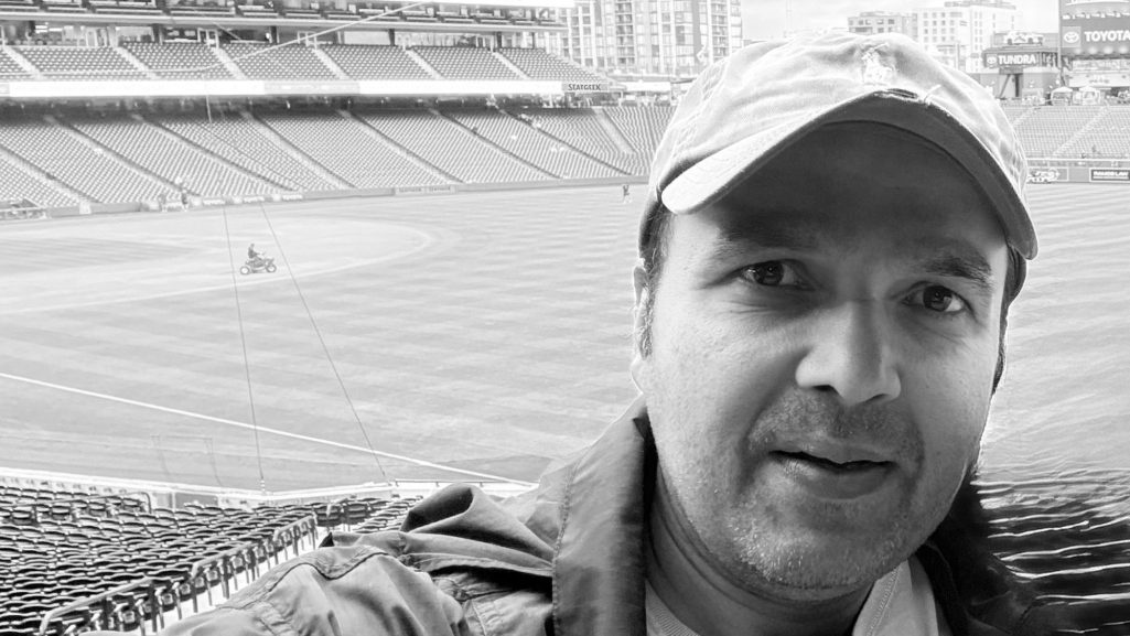 Author Photo Black & White author s n kumar standing in baseball stadium